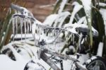 Ice Covered Frozen Bicycle Stock Photo