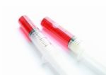 Syringe With Red Liquid Isolated On White Background Stock Photo