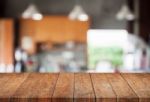 Perspective Wooden With Abstract Blur Coffee Shop Background Stock Photo