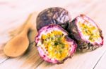 Passion Fruits On Wooden Background Stock Photo