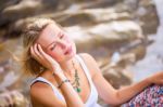 Beautiful Young Blonde Woman Posing Outdoor At The Rocky Sea Sho Stock Photo