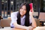 Asia Thai High School Student Uniform Beautiful Girl Read A Book Stock Photo