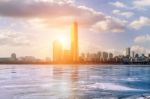 Ice Of Han River And Cityscape In Winter,sunset In Seoul, South Korea Stock Photo