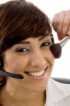 Call Center Lady Applying Make Up Stock Photo