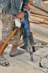 Man Using Jackhammer Stock Photo