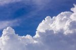 Clouds In Blue Sky Before Rain Stock Photo