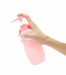 Hand Apply Bottle Pump On White Background Stock Photo