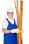 Worker Holding Boards Stock Photo