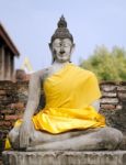 Ancient Buddha Statue At Wat Yai Chai Mongkol In Ayutthaya, Thai Stock Photo