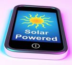 Solar Powered On Phone Shows Alternative Energy And Sunlight Stock Photo