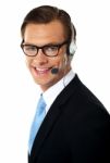 Smiling Call Centre Male Executive Stock Photo