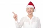 Cheerful Lady In Santa Cap Stock Photo