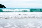 Sand Beach With Blue Ocean Stock Photo