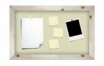 Blank Instant Photos And Notes On Cork Board Stock Photo