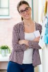 Beautiful Young Woman Looking At Camera In The Office Stock Photo