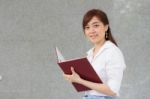 Portrait Of Thai Adult Businesswoman Beautiful Girl Read A Book Stock Photo