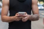 Man With Mobile Phone In Hands Stock Photo