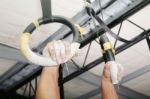 Human Hanging On Gymnastic Rings Stock Photo