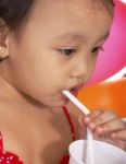 Child Is Drinking Stock Photo