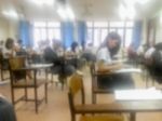 Blur Background University Students Writing Answer Doing Exam In Stock Photo