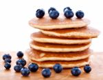 Stack Of Pancakes With Fresh Blueberries Stock Photo