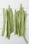 Common Beans On A White Wooden Background Stock Photo