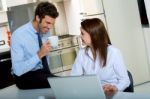 Businesspeople In Kitchen Stock Photo