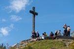 People Viewing The Countryside From Zwölferhorn Mountain Stock Photo