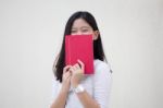 Portrait Of Thai Teen Beautiful Girl Reading Book Stock Photo