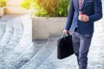 Full Length Picture Of A Young Business Man Walking Forward With Stock Photo