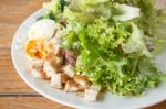 Homemade Salad Serving On Wooden Background Stock Photo