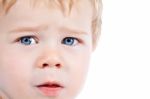 Toddler Blond And Blue Eyes Boy Child With Various Facial Expres Stock Photo