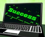 Success On Laptop Showing Solutions Stock Photo