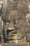 Ancient Stone Faces Of King Jayavarman Vii At The Bayon Temple, Stock Photo