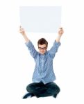 teenage Boy Showing Empty board Stock Photo