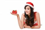 Santa Woman  Holding A Gift Box Stock Photo