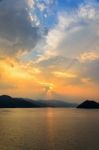 Sunset Over A Mountain At Lake Stock Photo