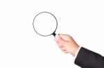 Businessman Holding Magnifying Glass Stock Photo