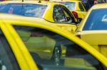 Yellow Taxi Sign On Cab Vehicle Roof Stock Photo