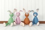 Rabbit Dolls Sitting On The Floor Stock Photo