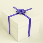 White Gift Box With Blue Ribbon Stock Photo