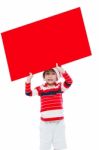 Christmas Asian Boy With Empty Banner Stock Photo