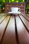 Coffee Cup On Wood Table Stock Photo