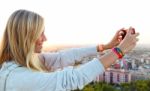 Beautiful Blonde Girl Taking Pictures Of The City Stock Photo