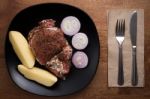 Raw Pork Steak Still Life On Wooden Background Stock Photo