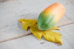 Papaya On Wooden Stock Photo