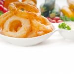 Golden Deep Fried Onion Rings Stock Photo