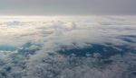 Flying Above The Clouds. View From The Airplane, Soft Focus Stock Photo