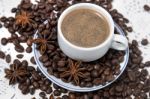 Coffee Cup With Spreaded Beans Stock Photo