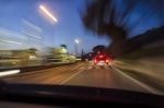 Night View Of A Car On Street Stock Photo